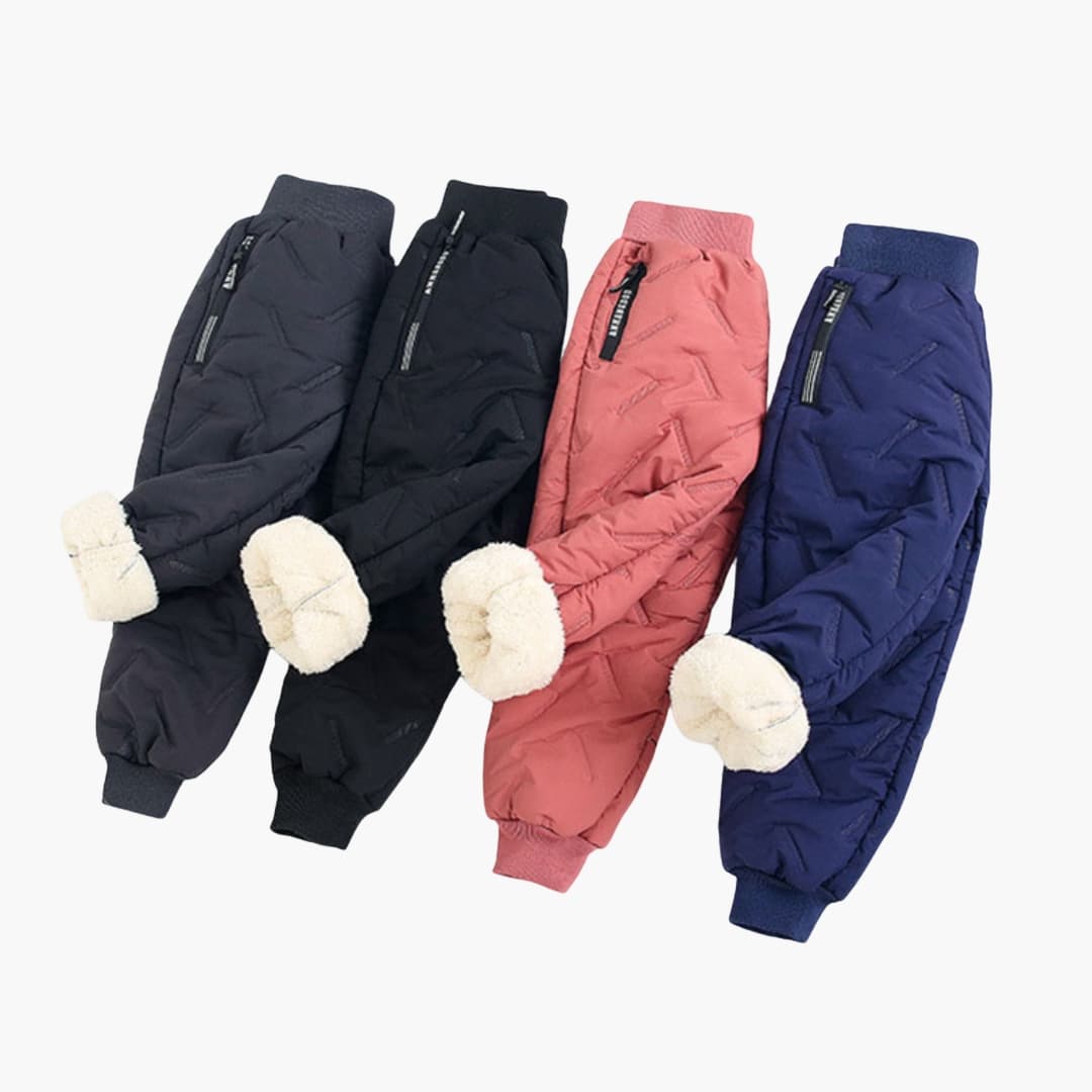 Children's Quilted Pants with Elastic Waistband, four colors grey, black, pink and navy, with cream faux-shearling cuffs.