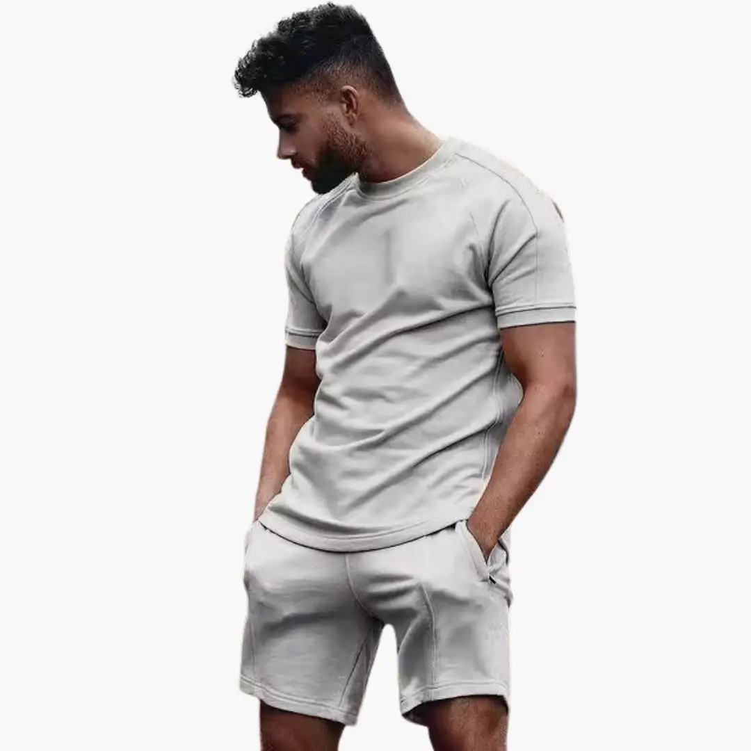 Men’s athletic two-piece set by Wilfred Smith: light gray short-sleeve T-shirt and matching shorts