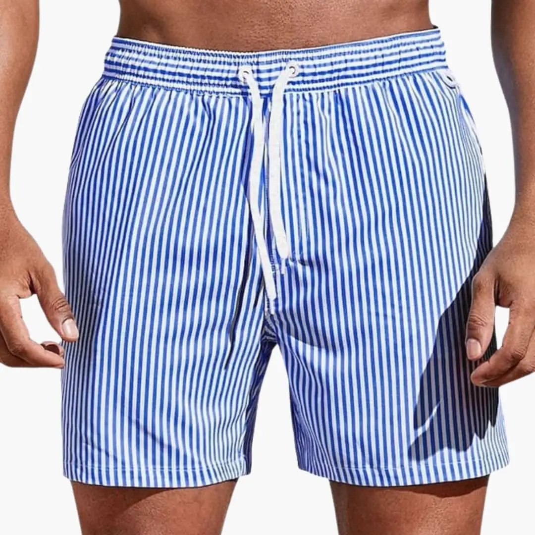 Men's board shorts with elastic waistband in blue and white striped pattern.