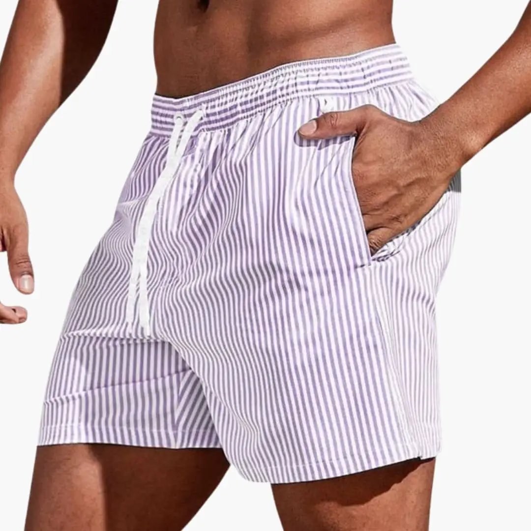Men’s board shorts with lavender and white vertical stripes and elastic waistband