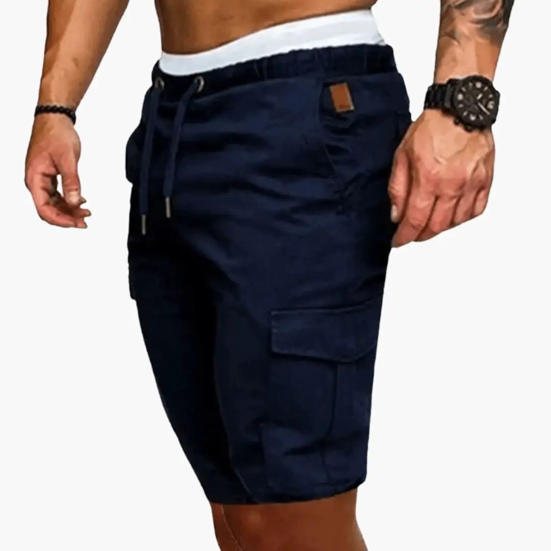 Men's navy cargo shorts with multiple pockets, drawstring waist, knee-length, loose fit
