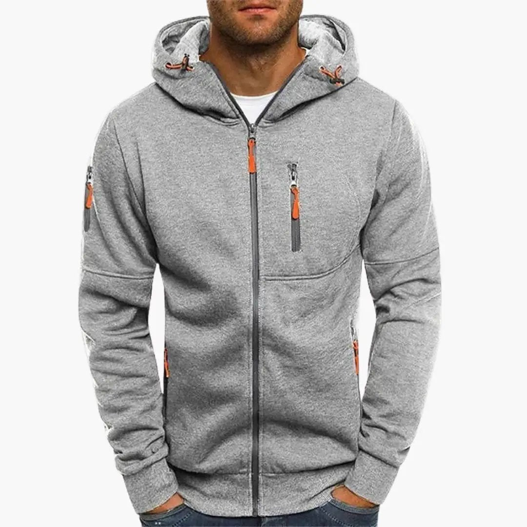 Men’s Full-Zip Hoodie by Wilfred Smith in heather gray with orange zipper pulls, adjustable hood, and zip chest pocket.