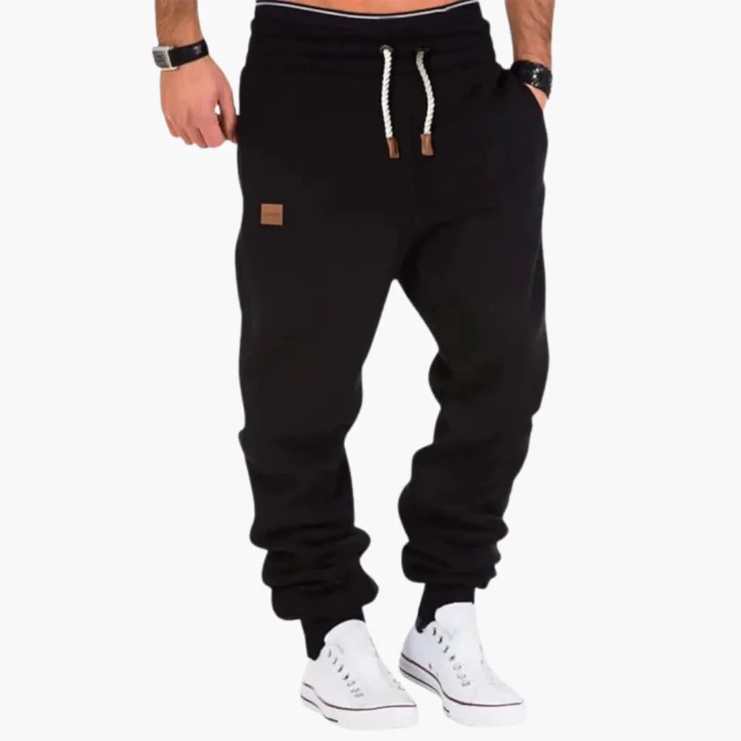 Wilfred Smith Men’s Jogger Pants with ribbed cuffs and pockets, black with white drawstring