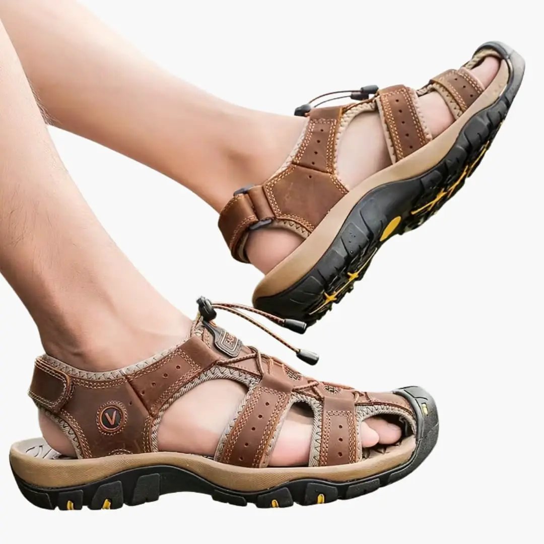 Men's Sandals by Wilfred Smith in brown leather with breathable design and soft sole.