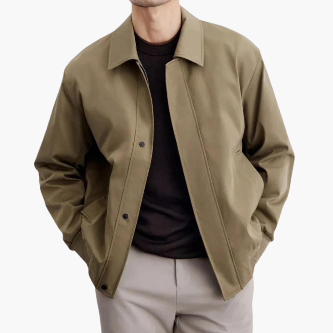 Men’s overcoat by Wilfred Smith in beige with pointed collar and button closure
