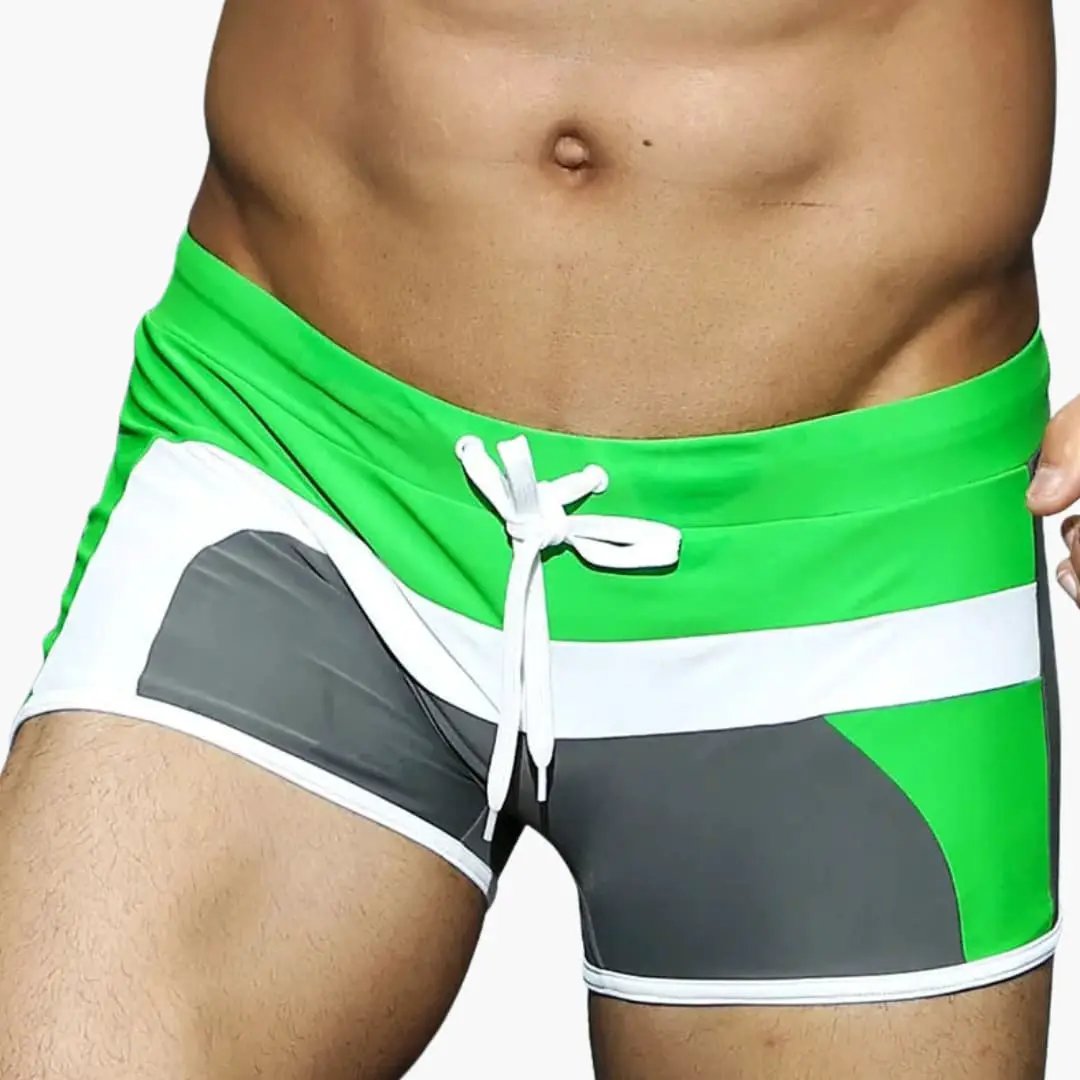 Men's short-length swim trunks with elastic waist, green white gray color-block pattern and drawstring