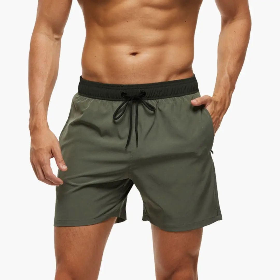Men’s Shorts with Elastic Waistband in olive green, black drawstring, and side pockets.