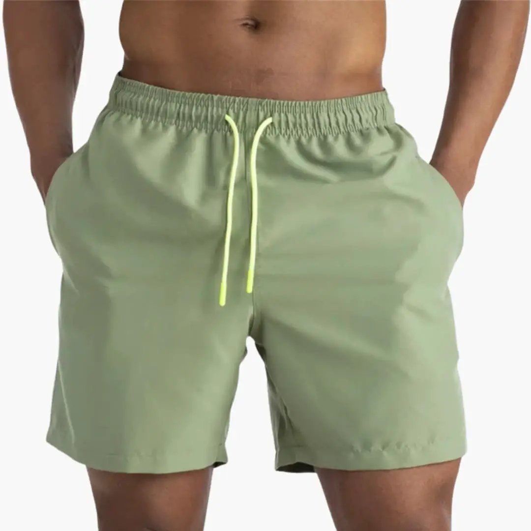 Men’s stretch jogger shorts in olive green with elastic waistband and neon drawstring