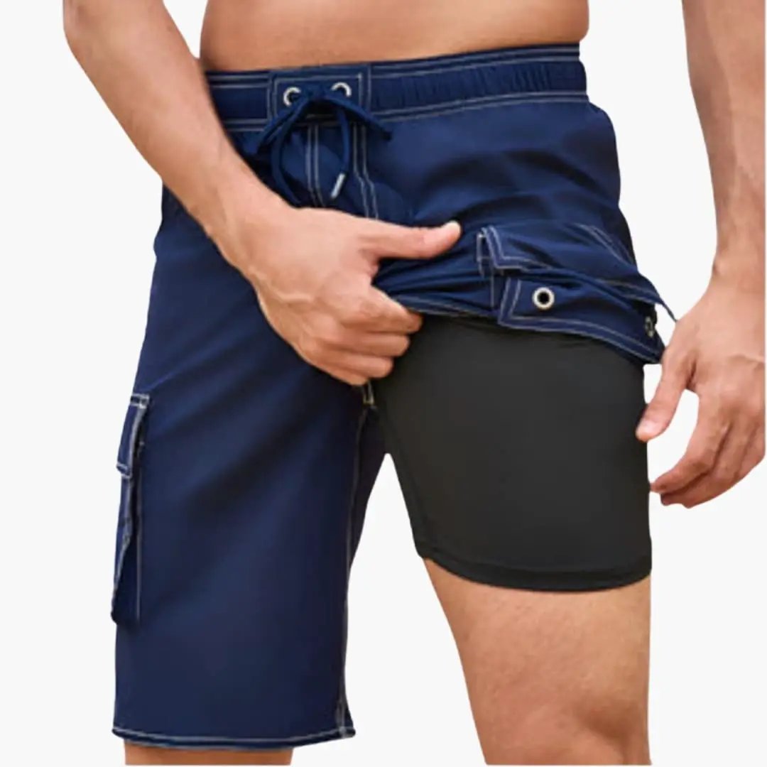 Men’s stretch swim shorts with inner lining and side cargo pocket in navy blue by Wilfred Smith