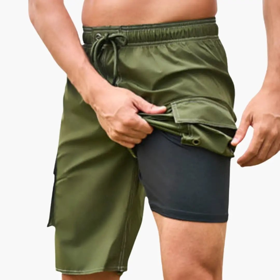 Men’s Stretch Swim Shorts by Wilfred Smith in olive green with inner lining and side cargo pocket, boardshorts