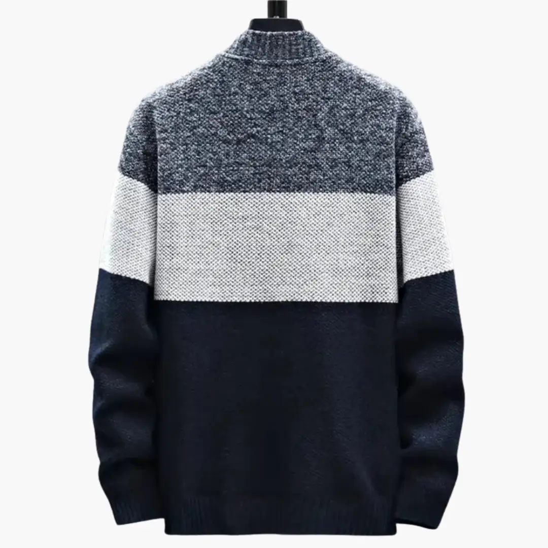 Men's color-blocked full-zip cardigan by Wilfred Smith with high collar in navy, light gray, and white.