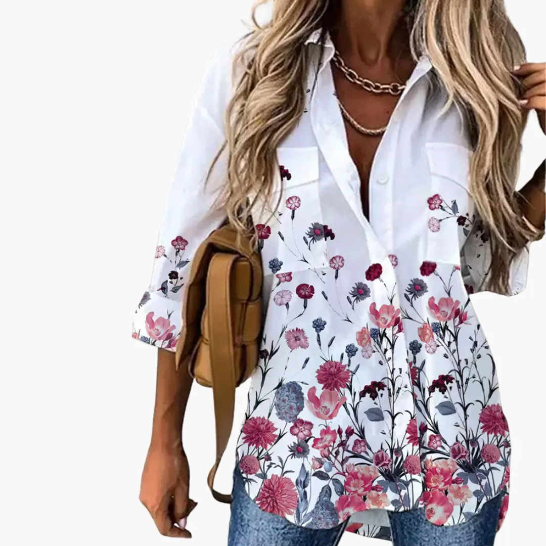 Blouse white with pink floral print along the lower half