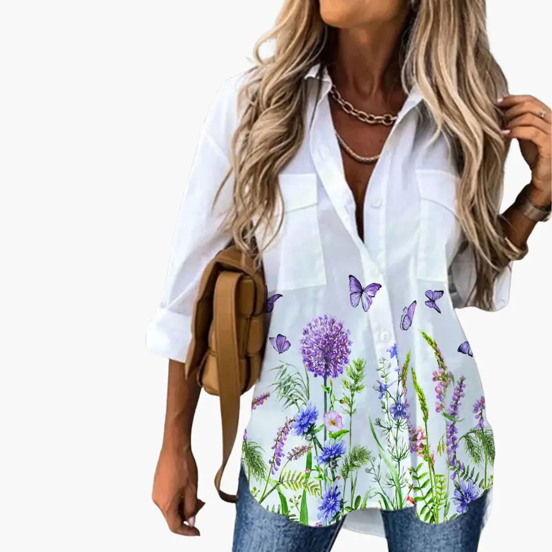 Summer blouse for women by Wilfred Smith with lightweight white fabric and purple butterfly and lavender flower print