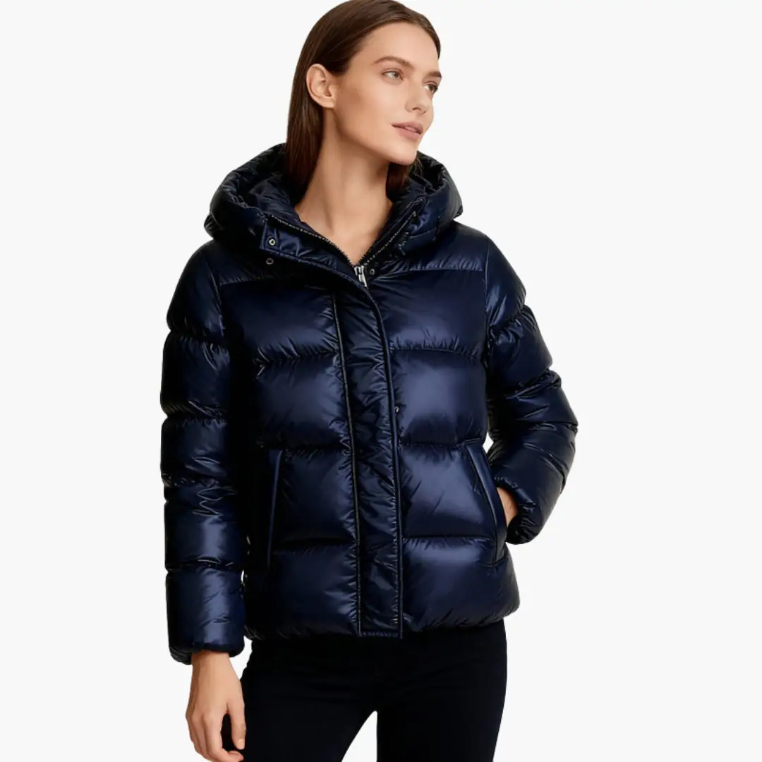 Women’s navy quilted hooded jacket with front zipper and pockets by Wilfred Smith
