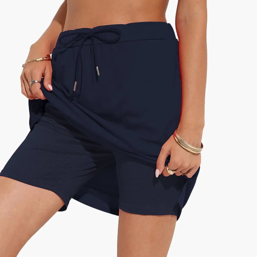 Women's navy A-line skirt with lace-up waist and panel seams