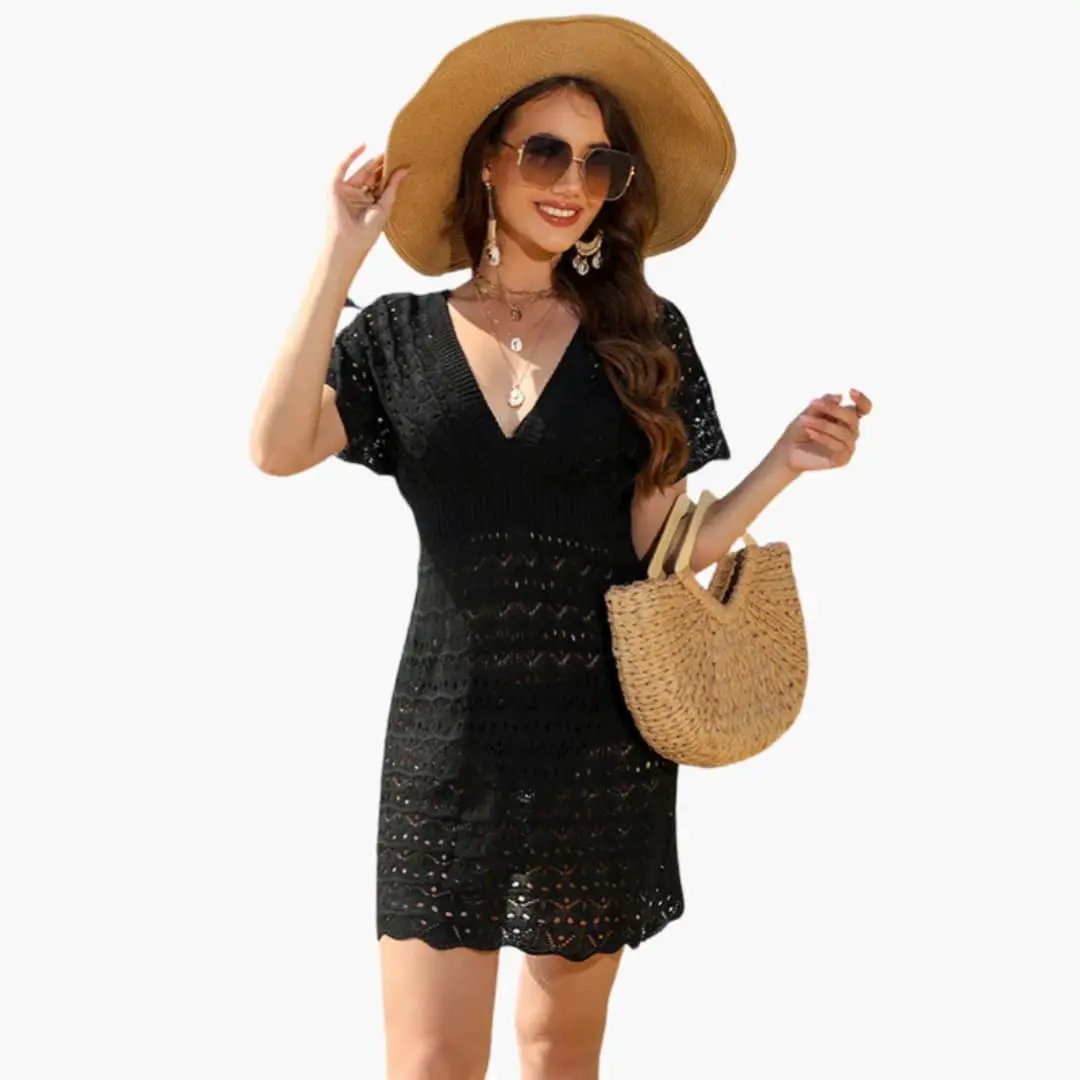 Women’s black crochet beach cover-up dress with V-neck and short sleeves.