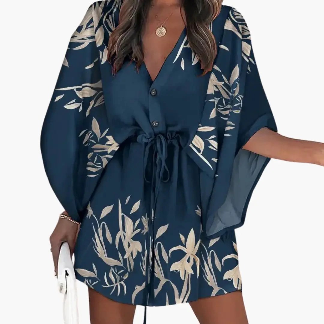 Women's beach dress by Wilfred Smith, navy blue with white floral print, waist tie, button front