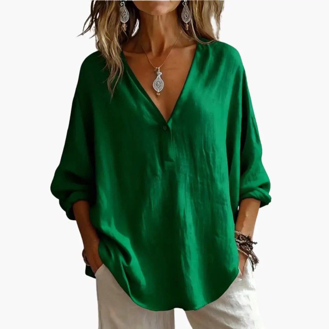 Women's green blouse with round neck and long sleeves
