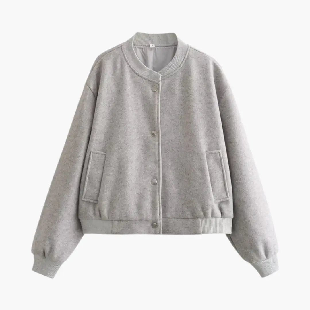 Wilfred Smith Women’s bomber jacket in heather gray with elastic hem and front pockets.