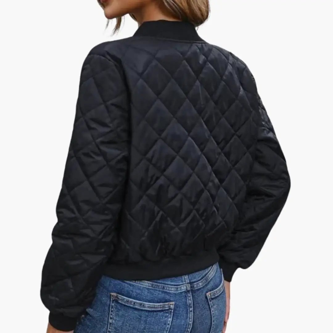 Womens bomber jacket by Wilfred Smith, black quilted jacket with zip and ribbed hem.