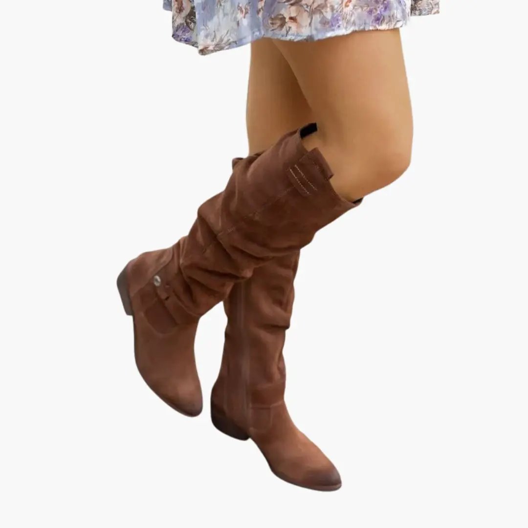 Women's knee-high brown suede boots by Wilfred Smith with side zipper and low heel