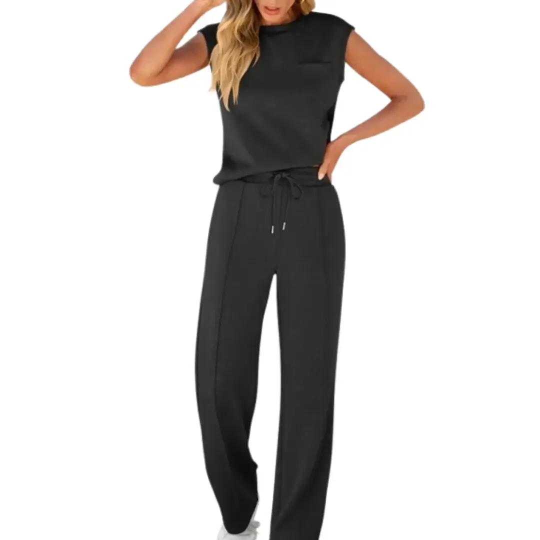 Women's co-ord set in black from Wilfred Smith, relaxed-fit top with short sleeves and drawstring pants
