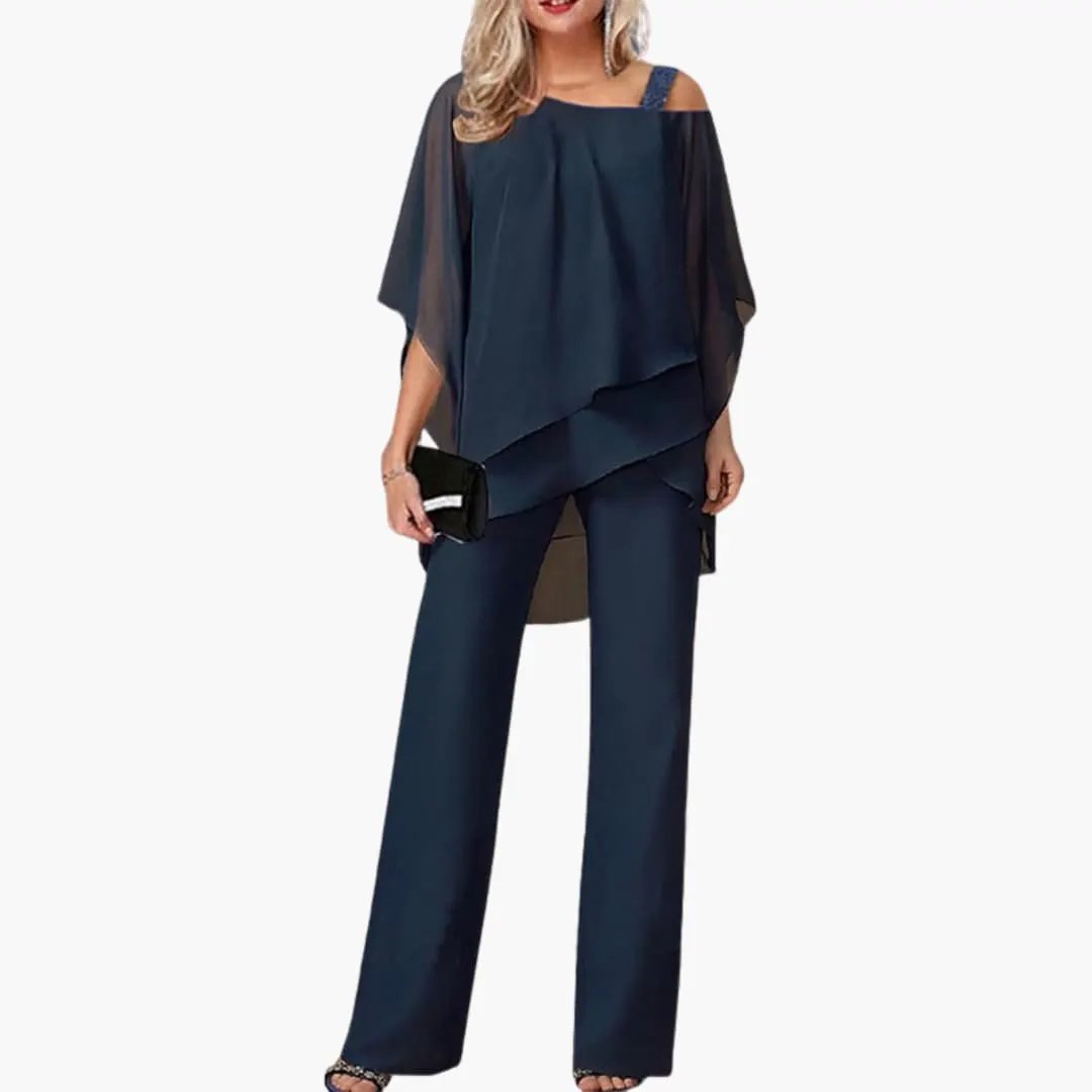 Women’s navy cold-shoulder wide-leg jumpsuit with sheer overlay top, one-piece style