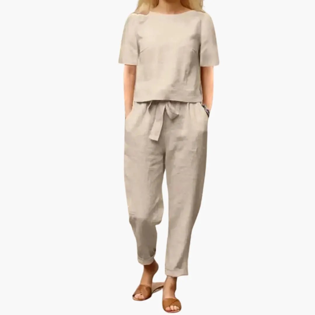 Women's coordinated jumpsuit set with short-sleeve top and beige straight-leg trousers, tie-waist belt