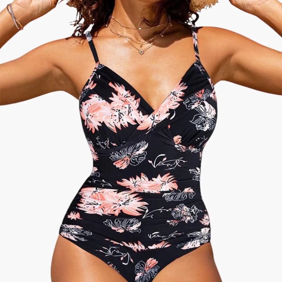 Women’s Cross Front Backless One-Piece Swimsuit in black with pink floral print