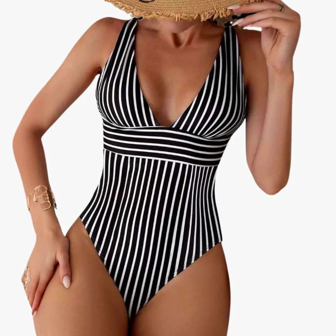 Women’s deep V-neck one-piece swimsuit in black-and-white stripes, high-leg cut by Wilfred Smith.