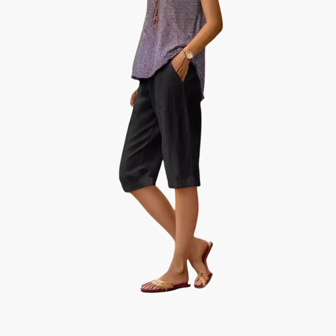 Women's drawstring-waist shorts with pockets in black, relaxed-fit knee-length.