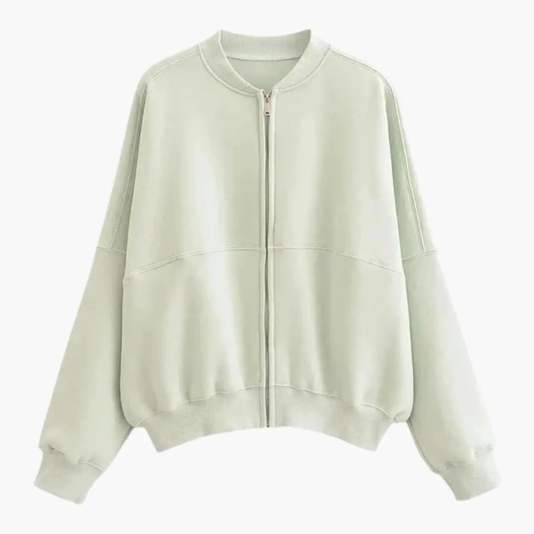 Women's fleece bomber jacket in pale mint green with zip front and ribbed cuffs
