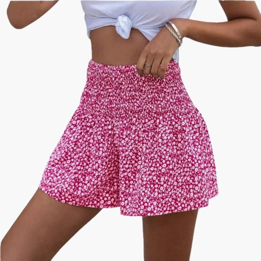 Women's floral print elastic waist shorts in pink with small white flowers