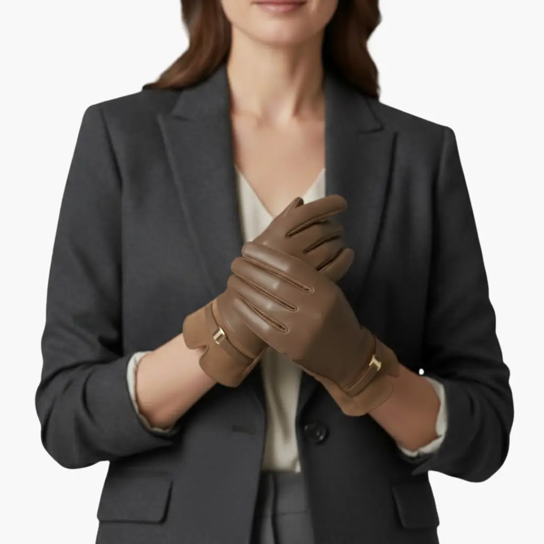 Women’s full-finger brown leather gloves with decorative strap and lined interior