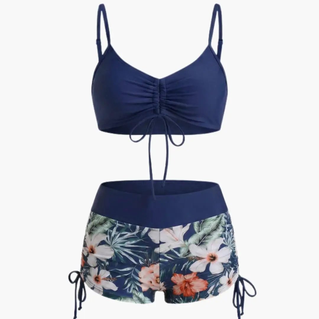 Women’s High-Waisted Floral Two-Piece Bikini Set, navy ruched top with tie and tropical floral bottoms.