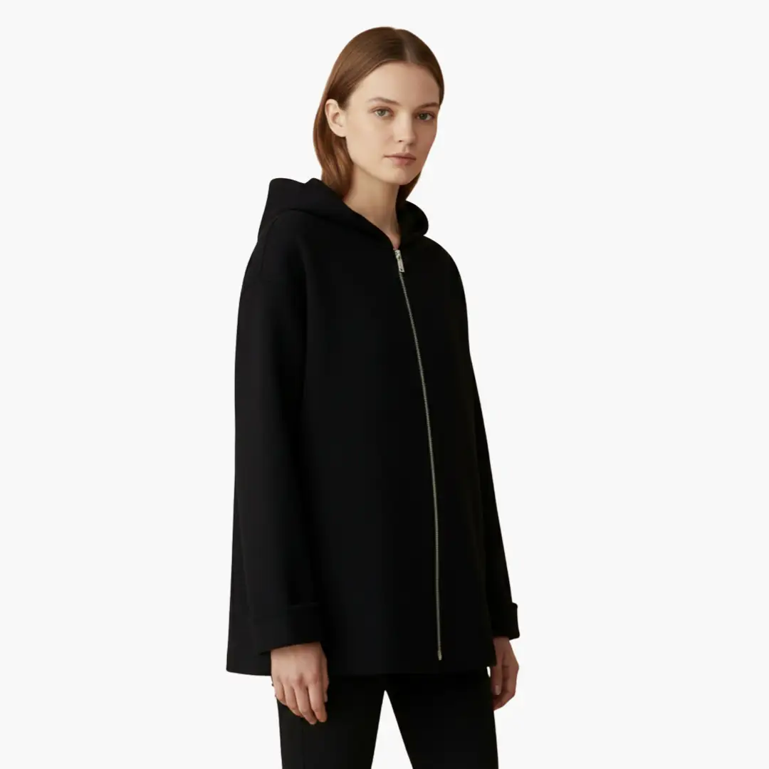 Women's hooded jacket in black with front zipper, wrap-style fit and pockets