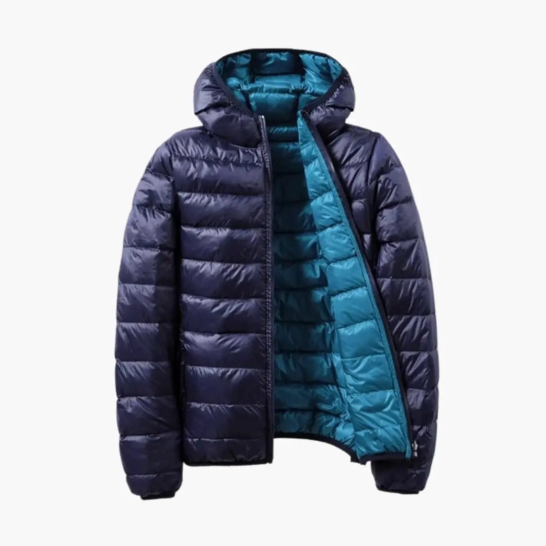 Women’s reversible puffer jacket with hood - navy exterior, teal interior lining
