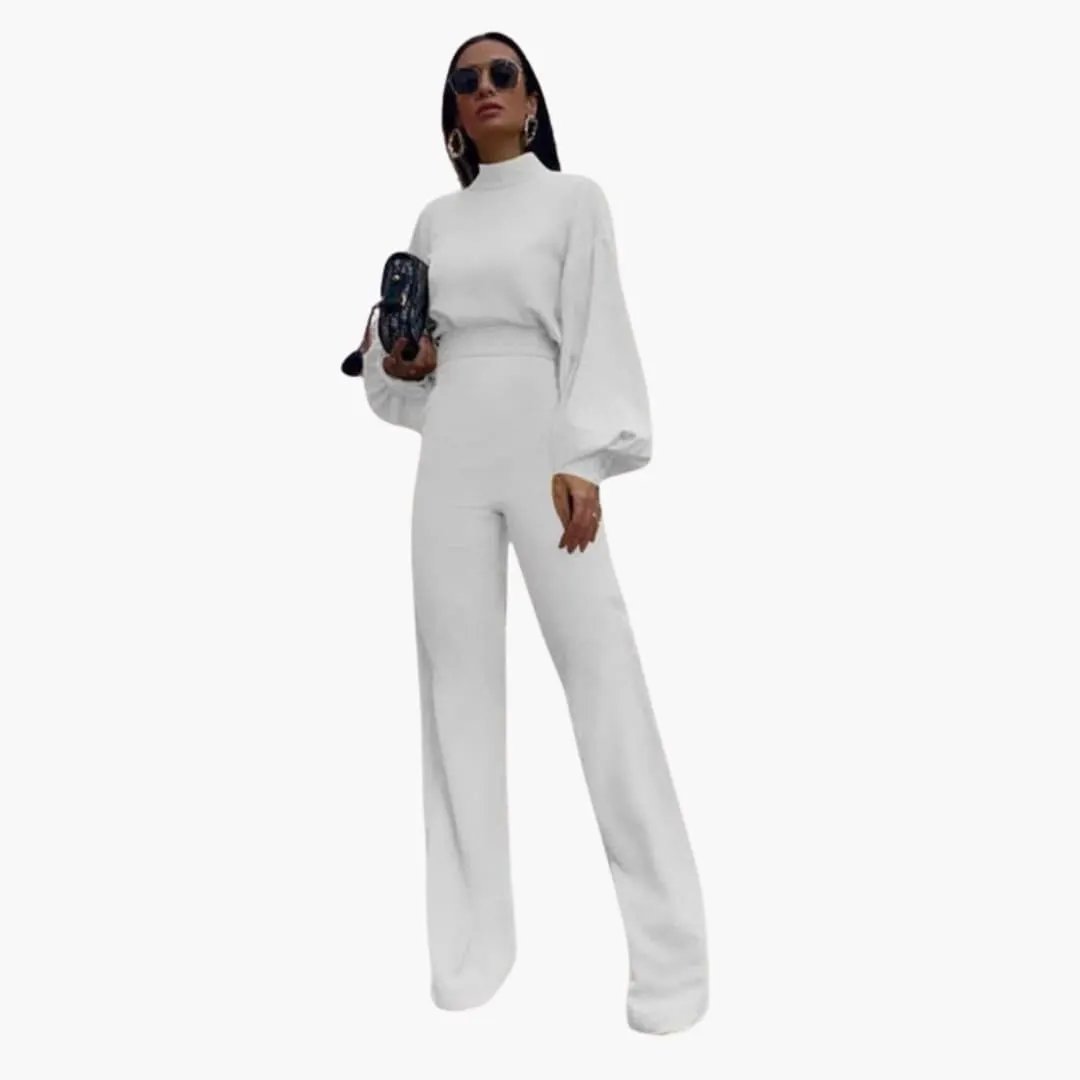 Wilfred Smith women’s one-piece jumpsuit in white with half collar and long puff sleeves