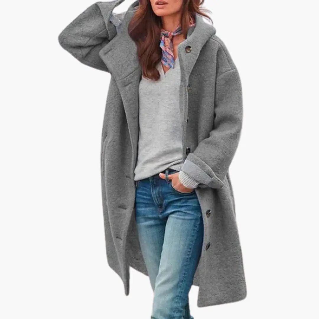 Women’s Long Coat with Stand Collar and Front Zip Closure in gray, worn over jeans.