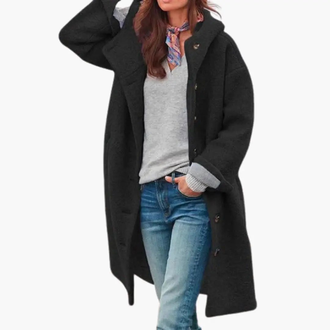 Women’s long black coat with stand collar and front zip closure.