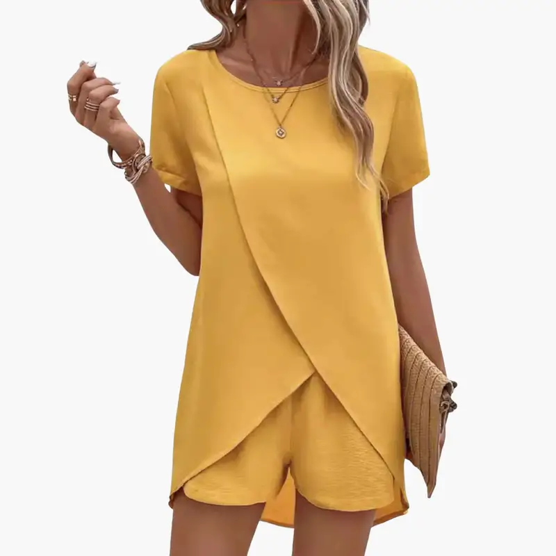 Women's lounge set by Wilfred Smith in yellow with short-sleeve top and elastic-waist shorts.