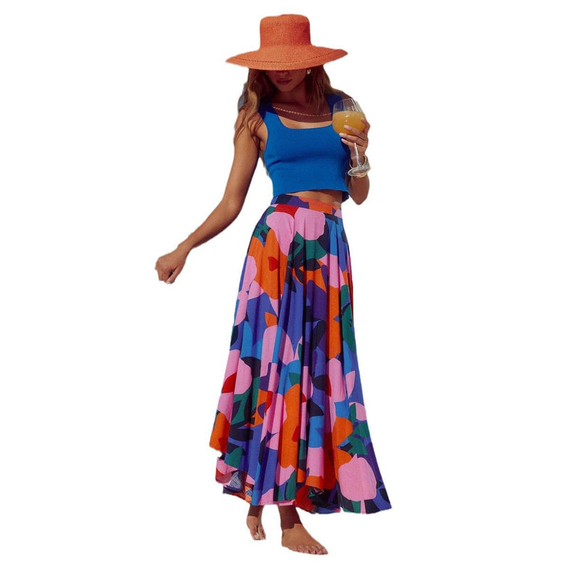 Women's Maxi Skirt with Elastic Waistband and Colorful Abstract Print, shown with blue top and orange hat