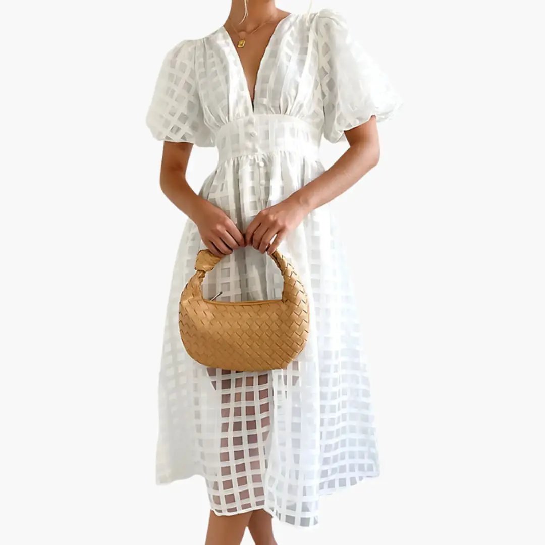 Women's Midi Dress in white lattice weave with puff sleeves and defined waist.