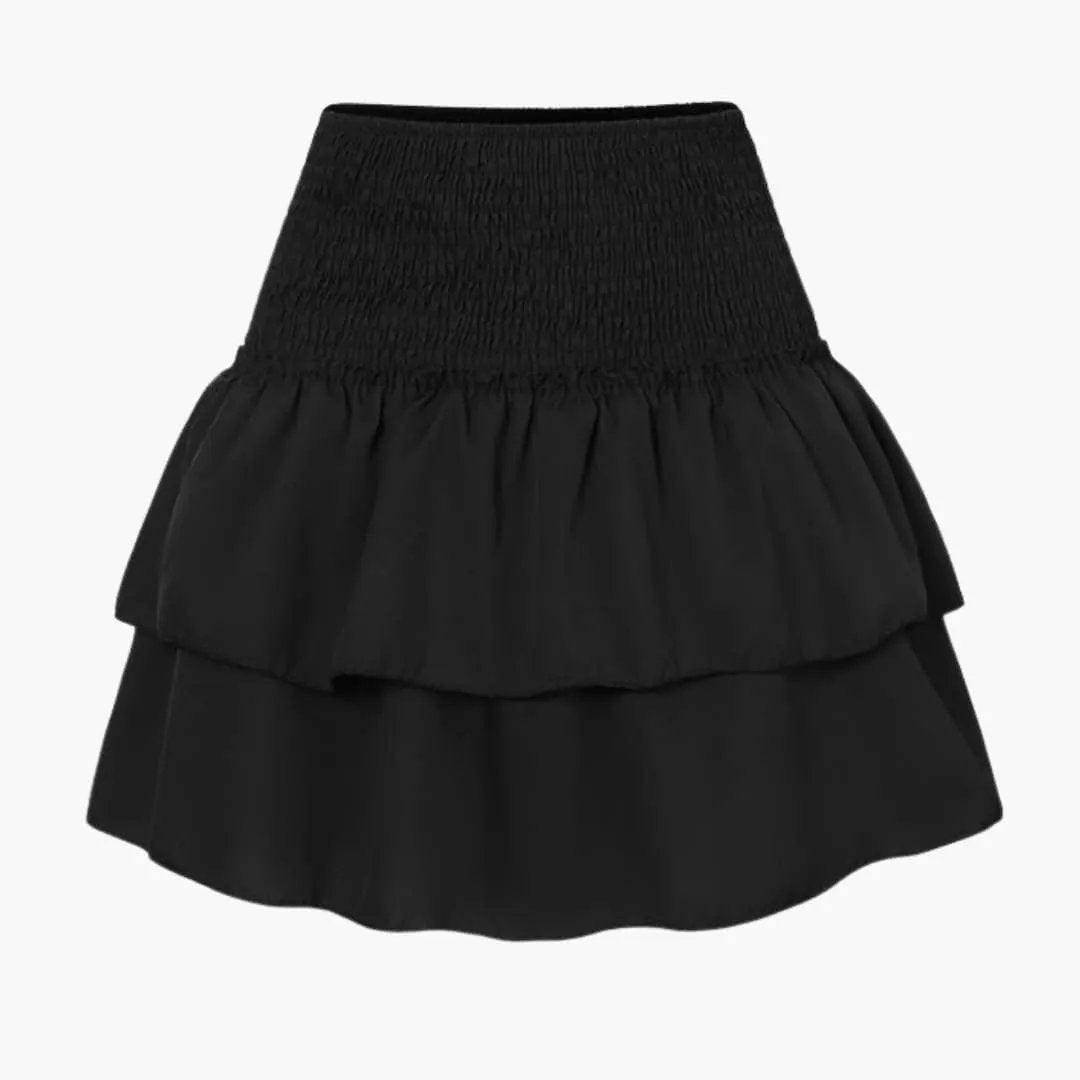 Women's midi skirt in black with a smocked elastic waistband and two-tier ruffle hem