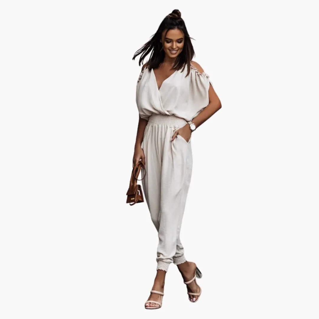 Wilfred Smith women's open-shoulder jumpsuit in beige with wrap V-neck and elastic waist