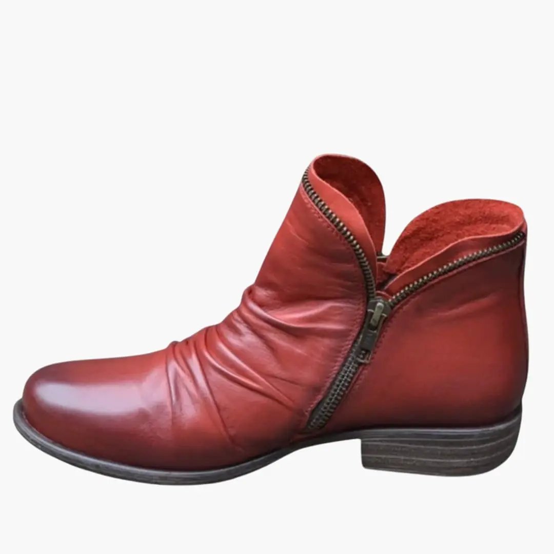 Women's orthopedic boot by Wilfred Smith in red leather with side zipper and cushioned interior.