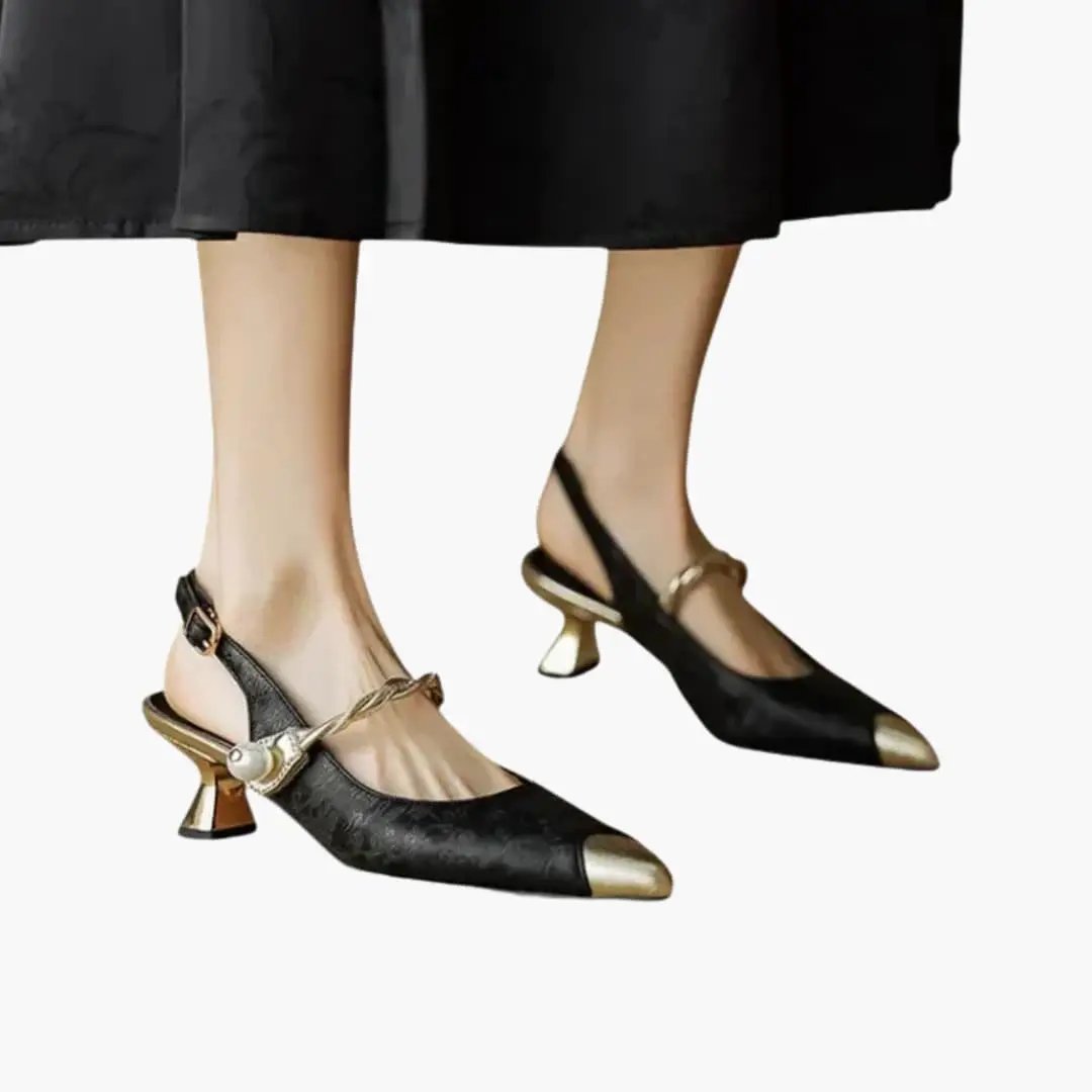Women's orthopedic heels by Wilfred Smith; black textured surface with gold toe cap and pearl strap