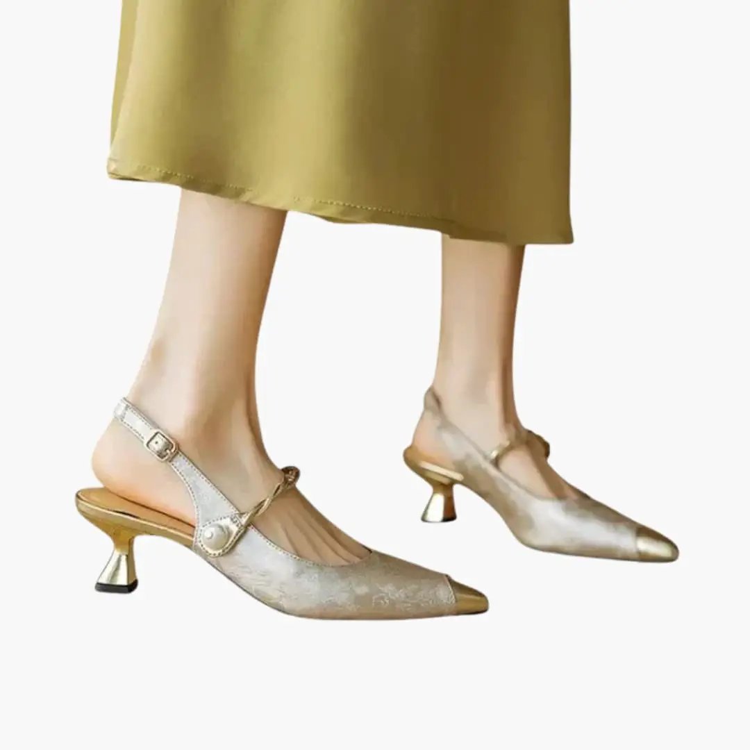 Wilfred Smith women's orthopedic heels with pearl strap, metallic silver textured surface.