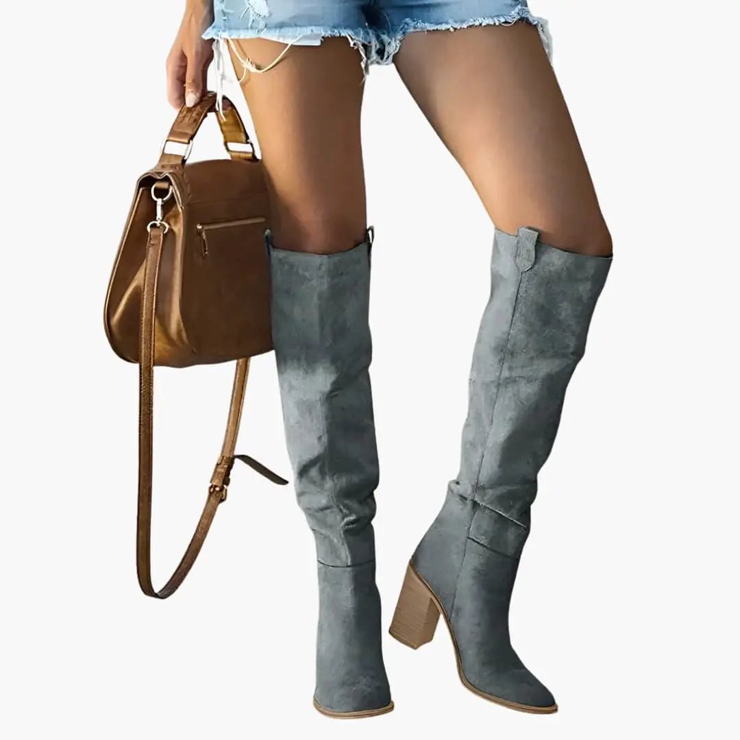 Women's orthopedic knee-high boots in gray suede with a chunky heel.