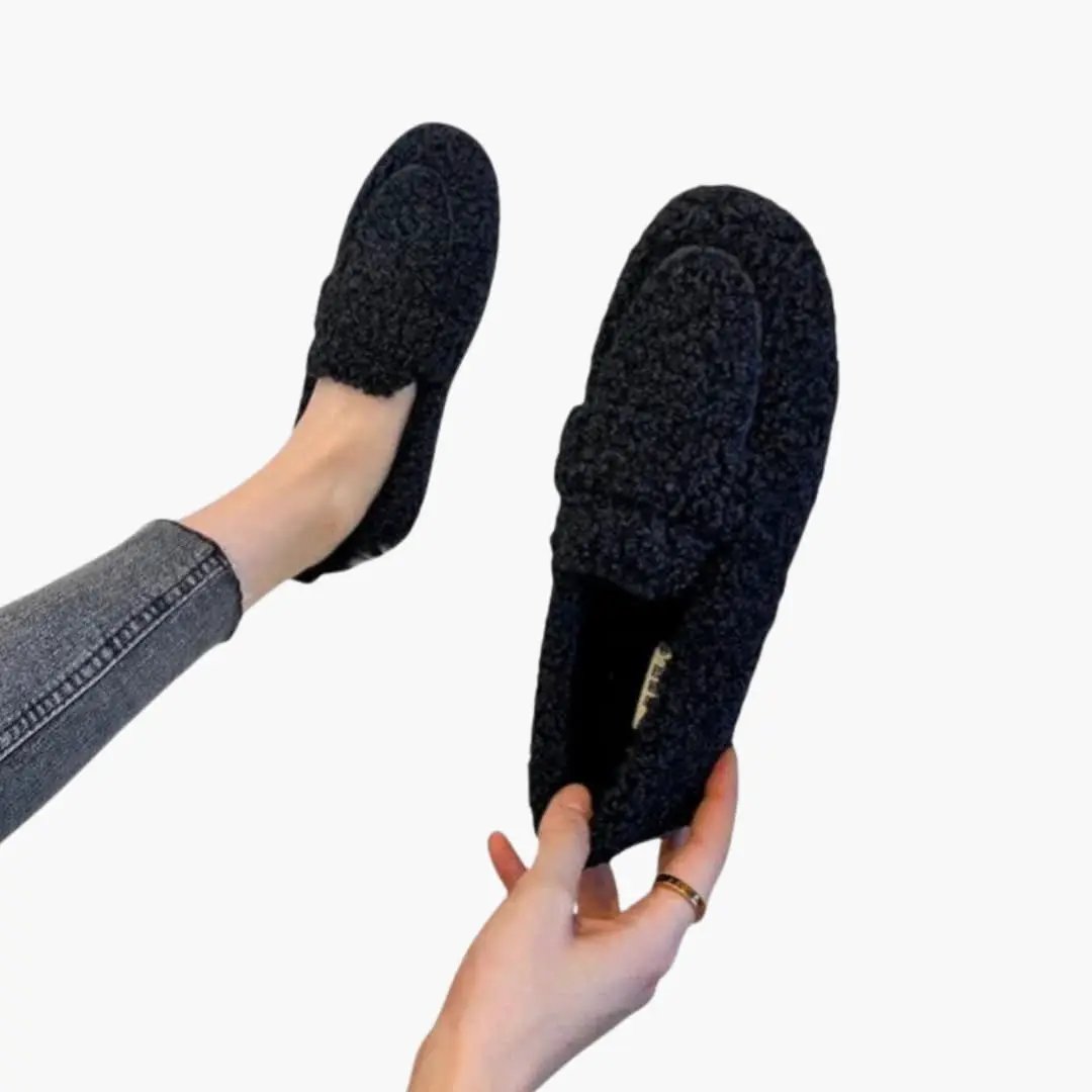 Pair of Wilfred Smith women's orthopedic loafers, black boucle slip-on flats with rubber sole